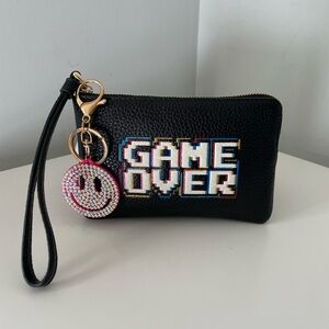 Coach ‘Game Over' Corner Zip Wristlet